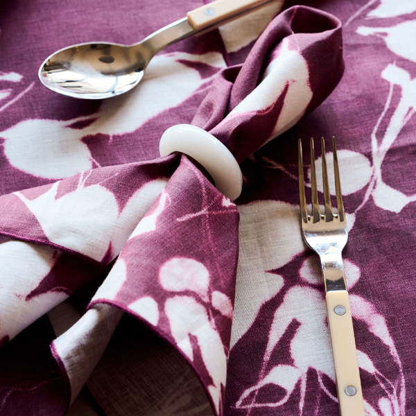 Porto Print Aubergine linen dinner napkin with hand-painted cascading floral pattern in deep aubergine and jewel tones - Goldie Home